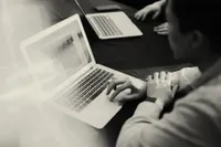 Executive working on a laptop
